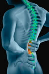 Man holding his spine in pain